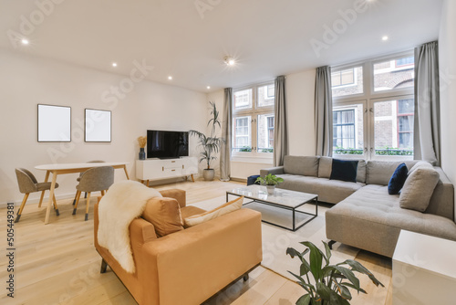 Couch in living room with frames