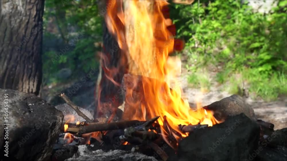Burning fire among stones in nature, outdoor recreation. Burning fire among stones in nature, outdoor recreation.