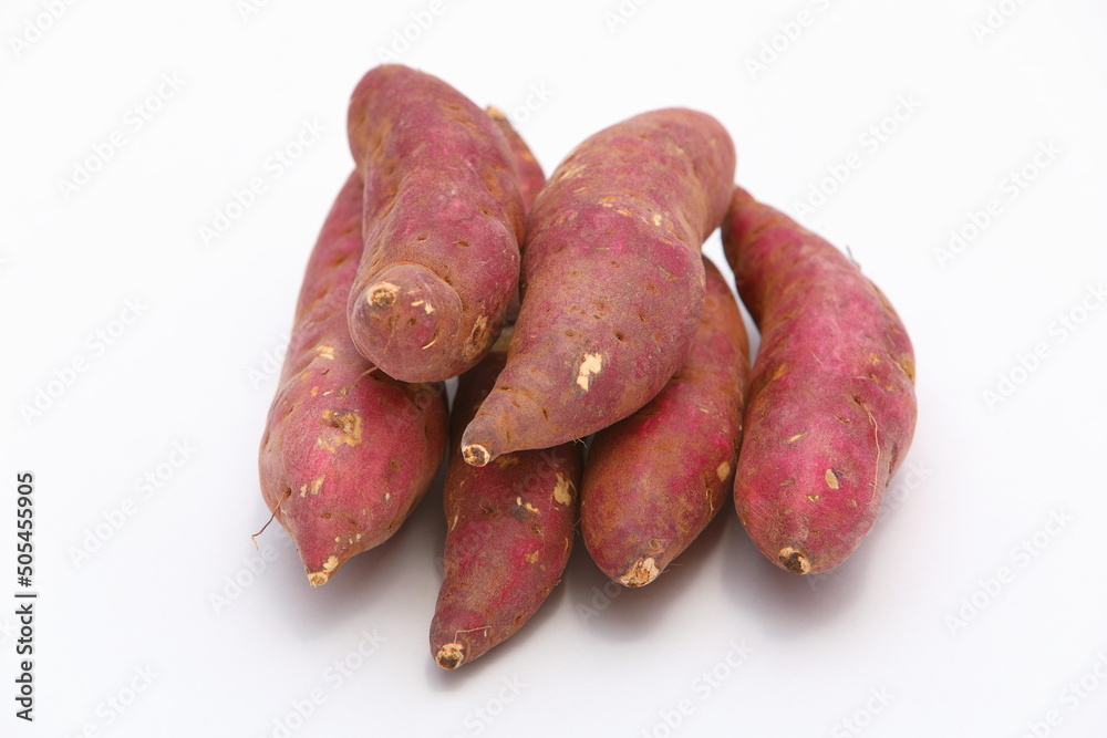 Closeup group of Sweet potatos isolated on white background Closeup group of Sweet potatos isolated on white background