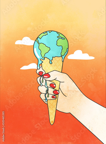 réchauffement climatique, main qui tient une glace comme une planète terre qui fond photo