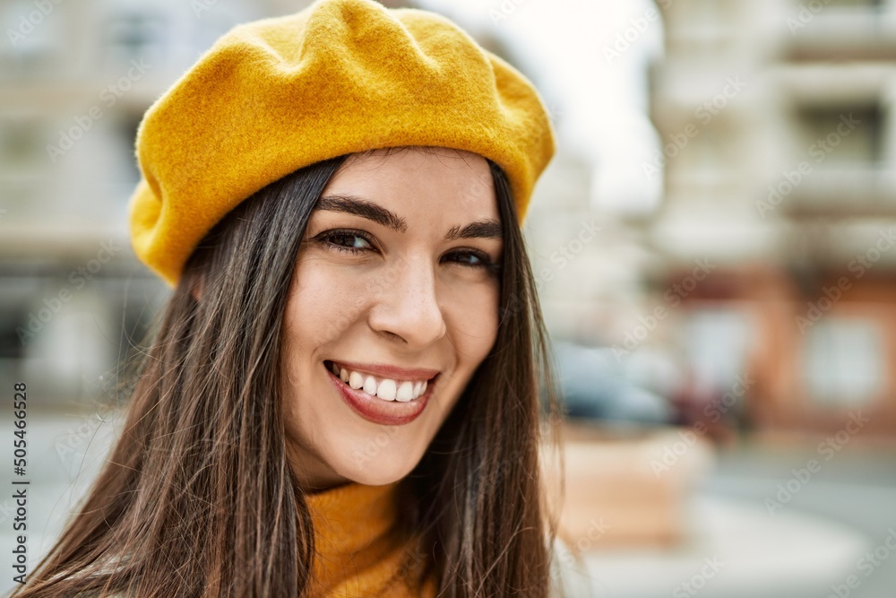 Young hispanic girl smiling happy standing at the city. Young hispanic girl smiling happy standing at the city.
