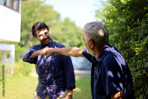 Father and son talking and sharing discussion lifestyle for domestic life at home.