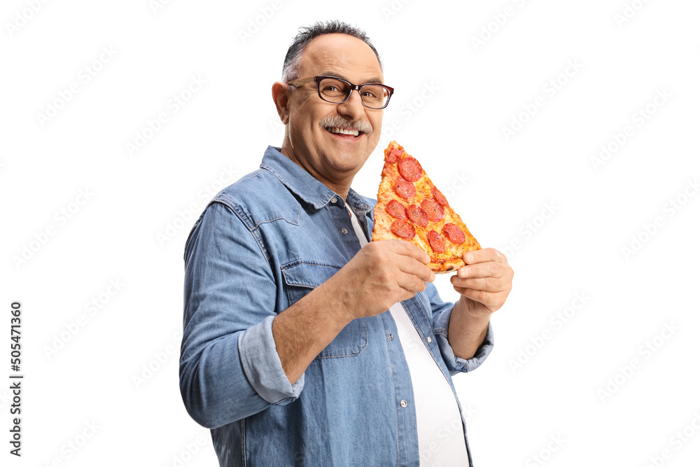 Cheerful mature man holding pepperoni pizza slice and smiling at camera Cheerful mature man holding pepperoni pizza slice and smiling at camera
