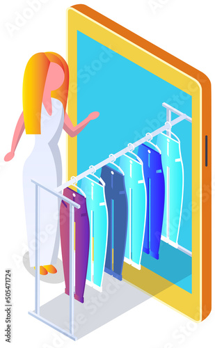 Woman choosing clothes, varicoloured dresses hanging on hangers, elements of wardrobe in store. Female shopper stylist standing at hanger and looking at outfit. Fashion clothes store, shopping concept