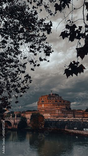 Vertical shot of Castel Sant'Angelo in Parco Adriano, Rome, Italy in cloudy sky background photo