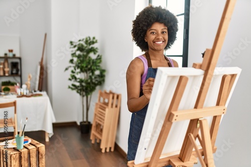 Young african american woman smiling confident drawing at art studio
