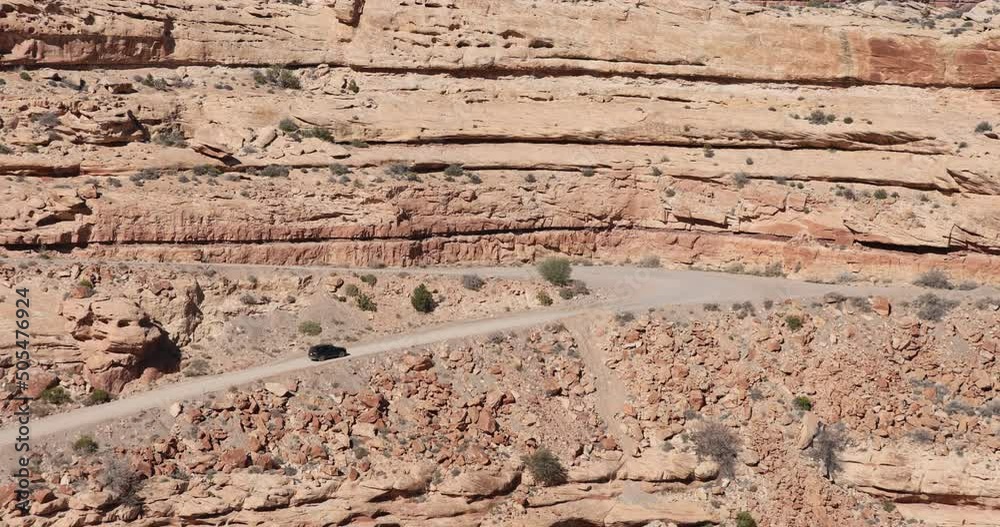 Moki Dugway steep mountain road desert Utah part 1. Roadway carved in a mountain cliff. Scenic
