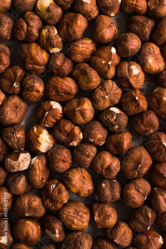 pile of raw hazelnut on white background