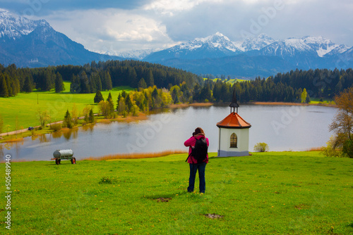 Chapel at Hegratsrieder See lake on an autumn morning, Ostallgäu, Bavaria, Germany photo