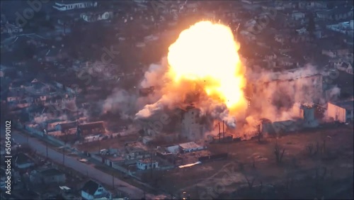 Missile blew up the house. Huge explosion of building. Mariupol war footage. photo