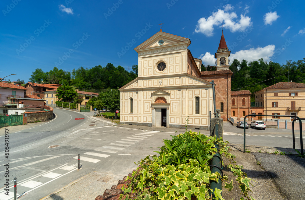 Farigliano, Cuneo, Italy - May 17, 2022: parish church of St. John the Baptist in piazza San Giovanni Farigliano, Cuneo, Italy - May 17, 2022: parish church of St. John the Baptist in piazza San Giovanni