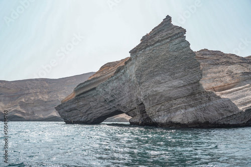 Nature in Muscat. A lot of rocky hills and a beautiful blue sea. 