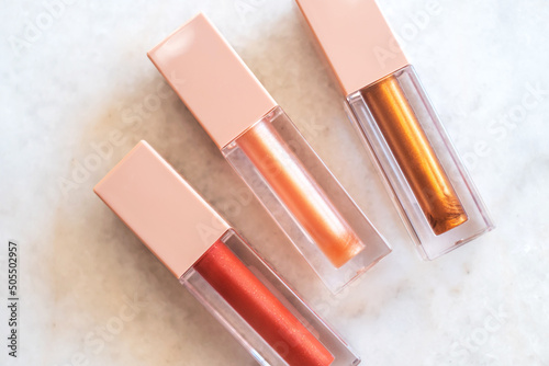 Three shades of trendy bronze lip gloss