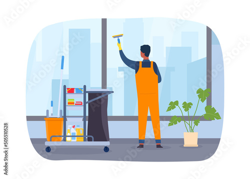Professional cleaning service. Male worker in professional uniform washing windows at office. Cleaner with special equipment