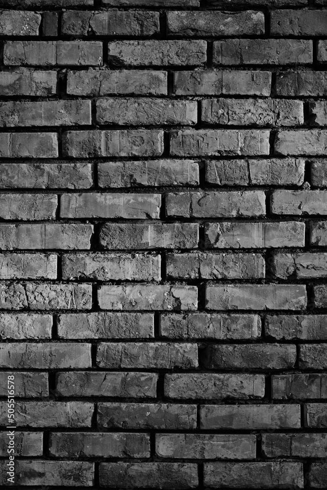 Background old brick wall in black and white photo.