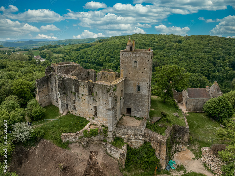 Aerial view of Brancion a hidden gem authentic medieval village in the heart of Southern Burgundy France with town gate, ruined Gothic medieval castle, living example of medieval military architecture