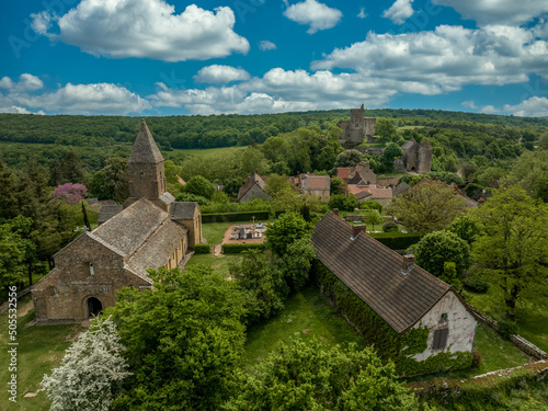 Aerial view of Brancion medieval village and castle largest fortress of Southern Burgundy above Grosne River of medieval military architecture photo