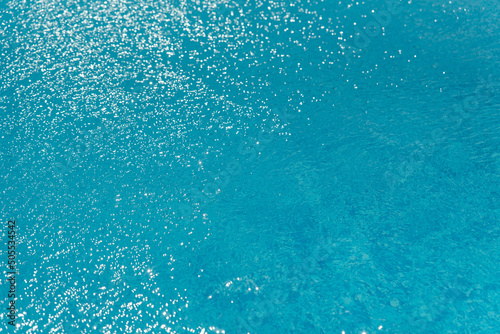Blue ripped water in swimming pool. water surface background