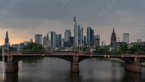 Frankfurt skyline at dusk with Ignatz Bubis bridge, Frankfurt,  Germany photo