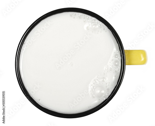 Milk in porcelain cup with bubbles isolated on white, top view 