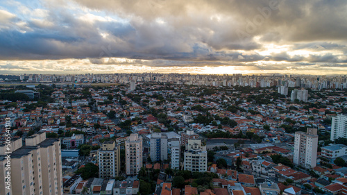 Aerial view of Sao Paulo at sunset with Congonhas Airport in the background. In the neighborhood of Planalto Paulista © Pedro