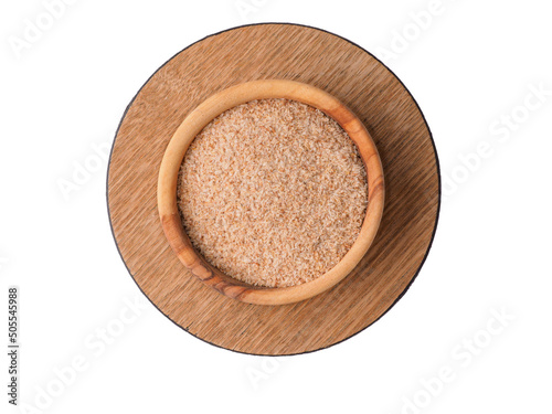 Psyllium husk in the plate on white background.