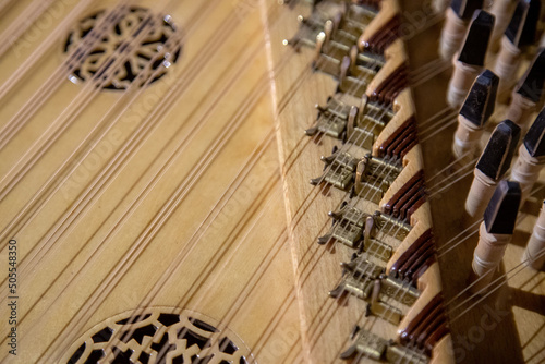 Qanun Middle Eastern instrument up close with grain and out of focus photo