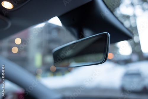 Closeup shot of a car's mirror. The model Tesla Y