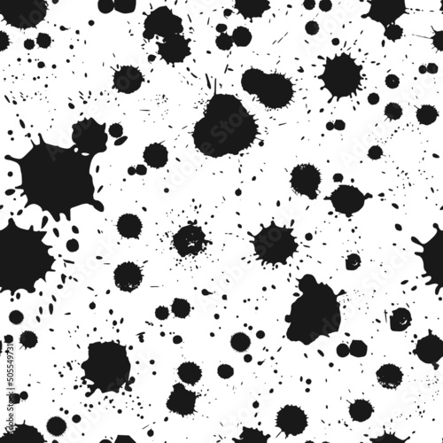 seamless background splattered with black liquid drops