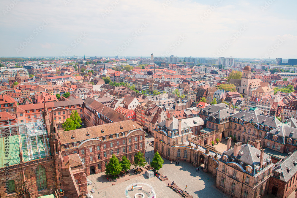 Beautiful panoramic view to old town of Strasbourg, Alsase, France. Old medieval buildings with orange roofs. Beautiful panoramic view to old town of Strasbourg, Alsase, France. Old medieval buildings with orange roofs.