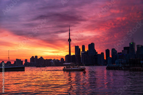 Photography Toronto, Canada - 06 16 2018: Water taxi boat mooring to Toronto Islands from In