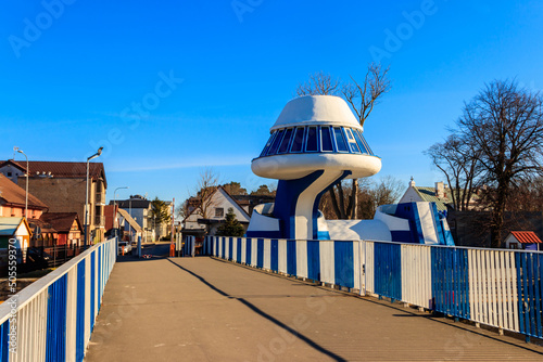 Sliding pedestrian bridge across the Wieprza river in Darlowko, Poland photo