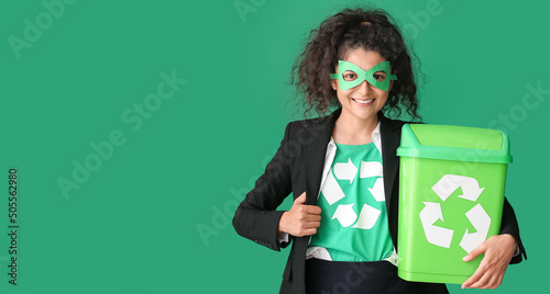 Woman dressed as eco superh...
