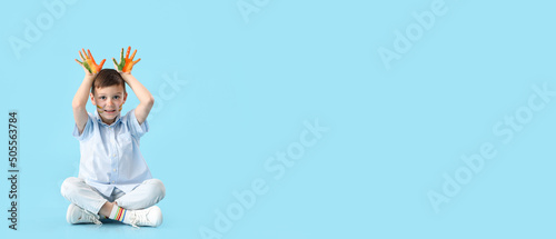 Cute little boy with hands ...