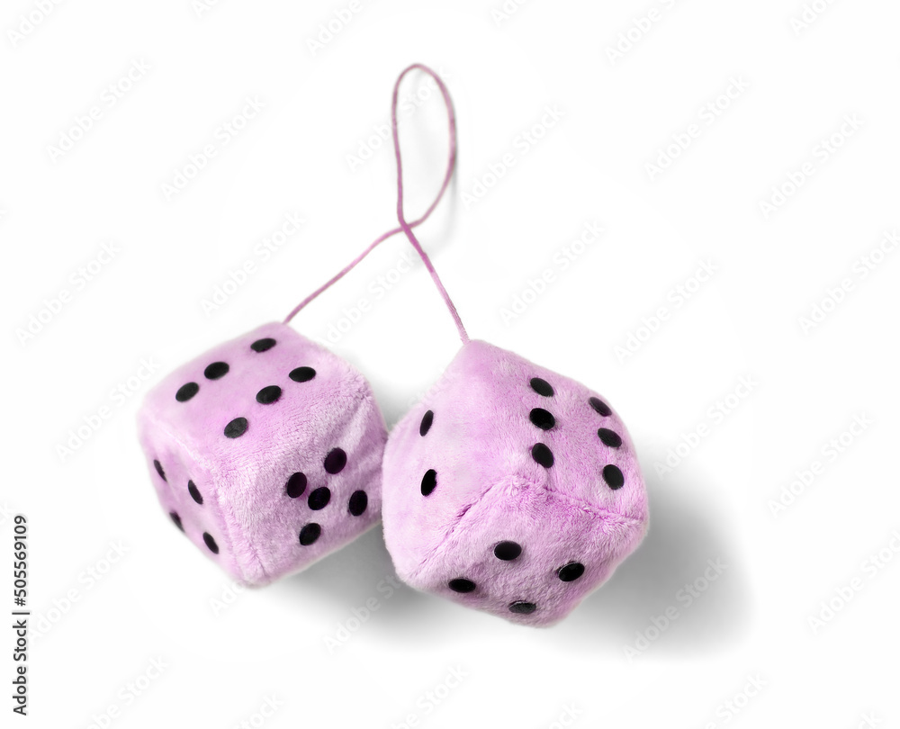 Φωτογραφία Pink fuzzy dice isolated on a white background