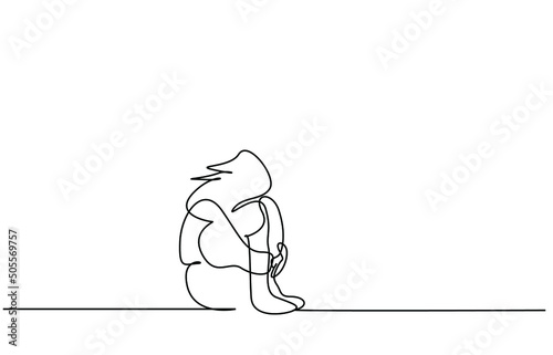 sad depressed lonely woman sitting on the floor