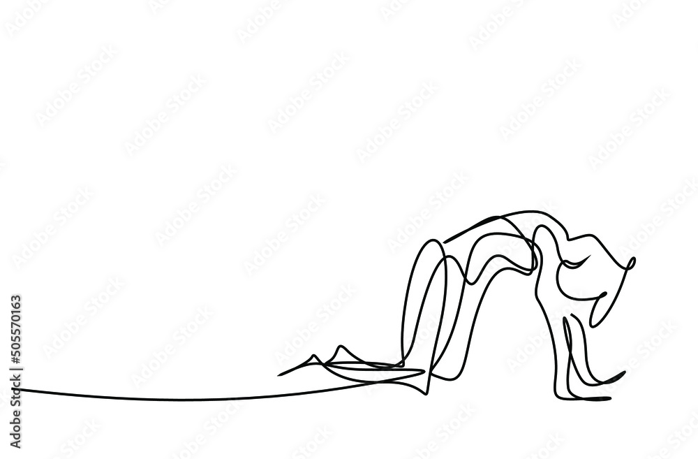 a woman practices yoga in dog pose on the floor