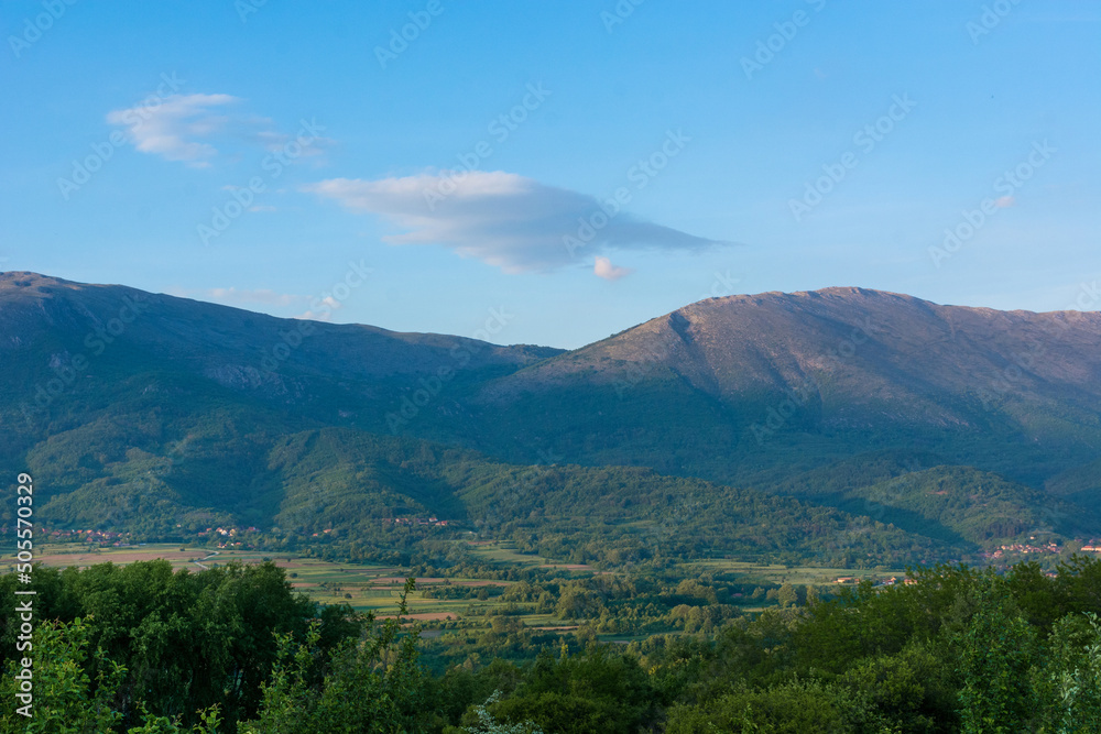 Beautiful view of Suva Planina in Serbia on a spring sunset. The top of the mountain is bare and rocky. Natural background concept