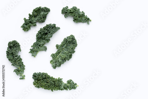 Kale leaves on white background. Top view