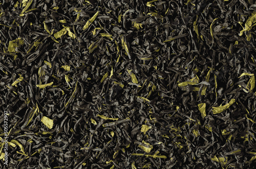 Realistic vector illustration of loose leaf tea background with cornflower and calendula petals. A blend of Ceylon black and green teas. View from above.
