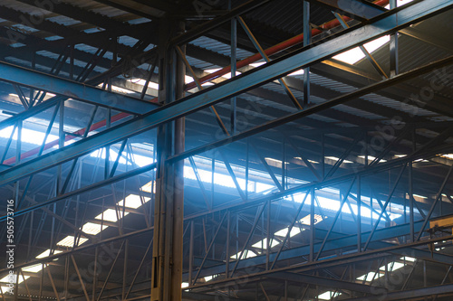 Interior of warehouse large metal structures ceiling roof
