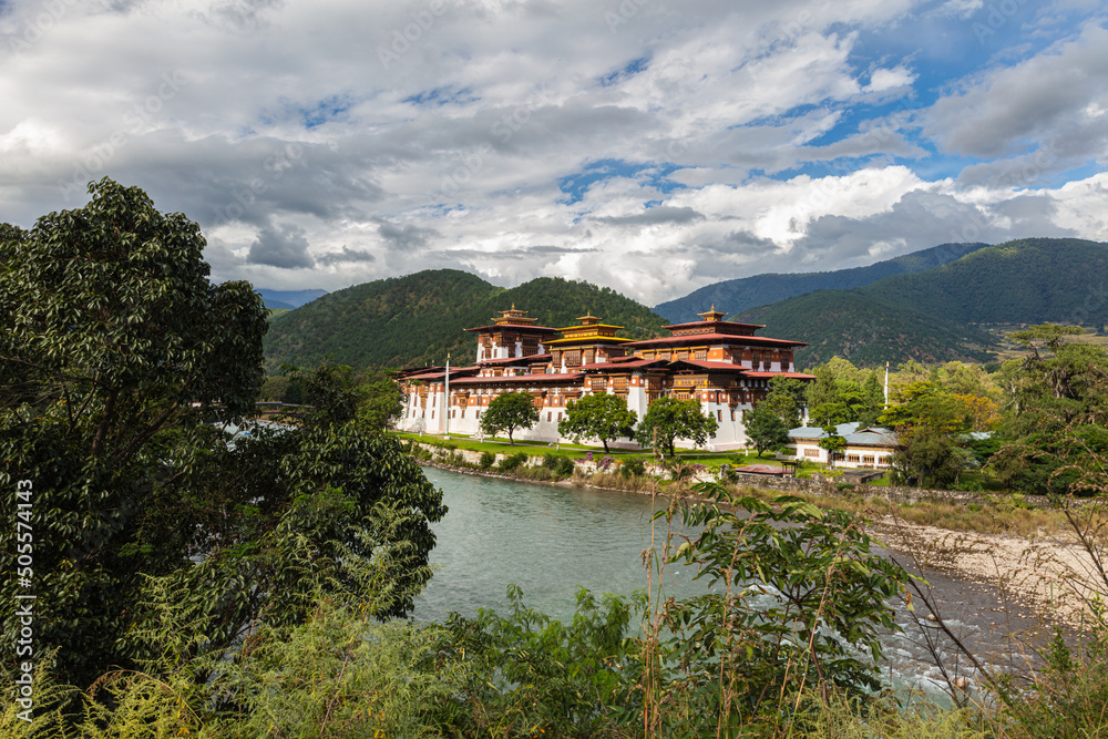 Bhutan - October 24, 2021: The Punakha Dzong between the Pho Chhu and Mo Chhu river in Bhutan. Punakha Dzong Monastery, one of the largest monasteries in Asia, Until 1955 seat of the Bhutan government