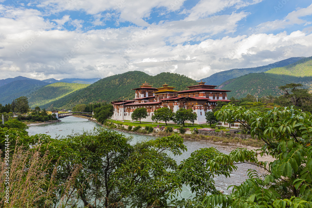 Bhutan - October 24, 2021: The Punakha Dzong between the Pho Chhu and Mo Chhu river in Bhutan. Punakha Dzong Monastery, one of the largest monasteries in Asia, Until 1955 seat of the Bhutan government