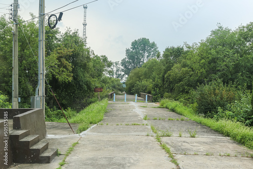 Panmunjom, South Korea - July 28, 2020: The bridge of no return in the Korean demilitarized zone or DMZ. Used for prisoner exchanges at the end of the Korean Armistice. Military Demarcation Line photo