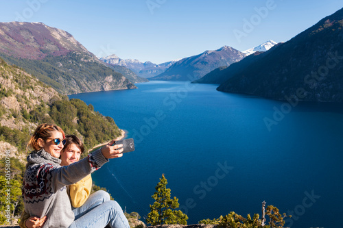 Mother and son having a sealie in the landscapes of Bariloche, Argentina.