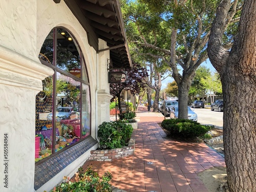 A view of the shops and restaurants with unique architecture, along the streets of Carmel by the Sea, California, United States photo