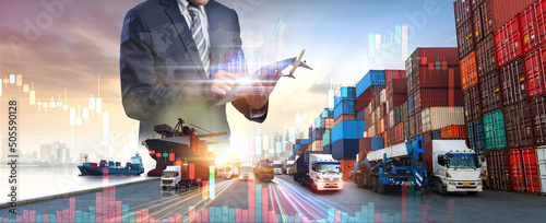 Multiple exposures of Businessman touching tablet for analyze stock at logistics port and world map with logistic network distribution