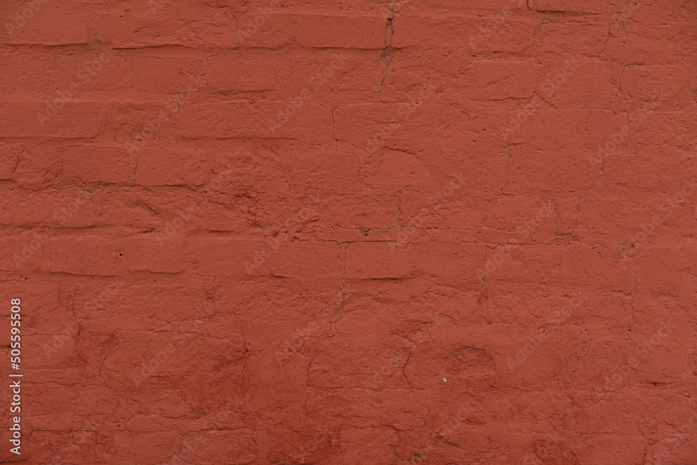 Brick red wall. Background of a old brick house. Brick red wall. Background of a old brick house.