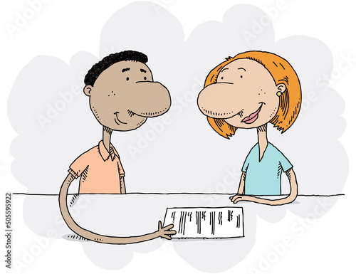 A young man and a mentor woman discuss a document on a piece of paper.