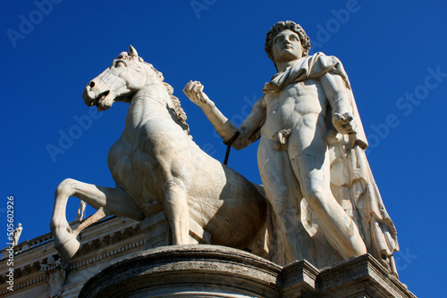 Statue of Castor with a horse in front of the Capitoline Hill, Rome, Italy photo